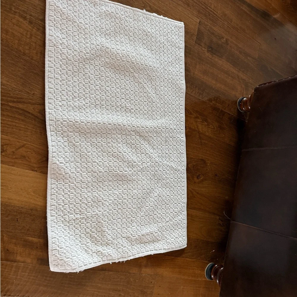 Bright white rug 34 by 20 does have some light fray  on edges.
